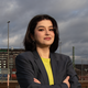 Portrait von Hacer Aydemir vor einem Berliner Panorama. Foto: Arsenius Maier